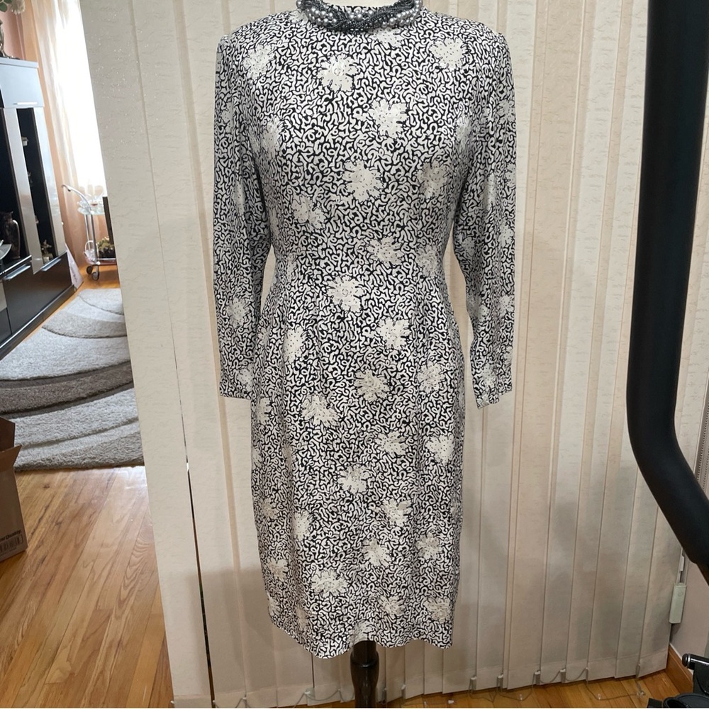 Elegant Beige 100 silk designer dress. Size 12. Good condition.